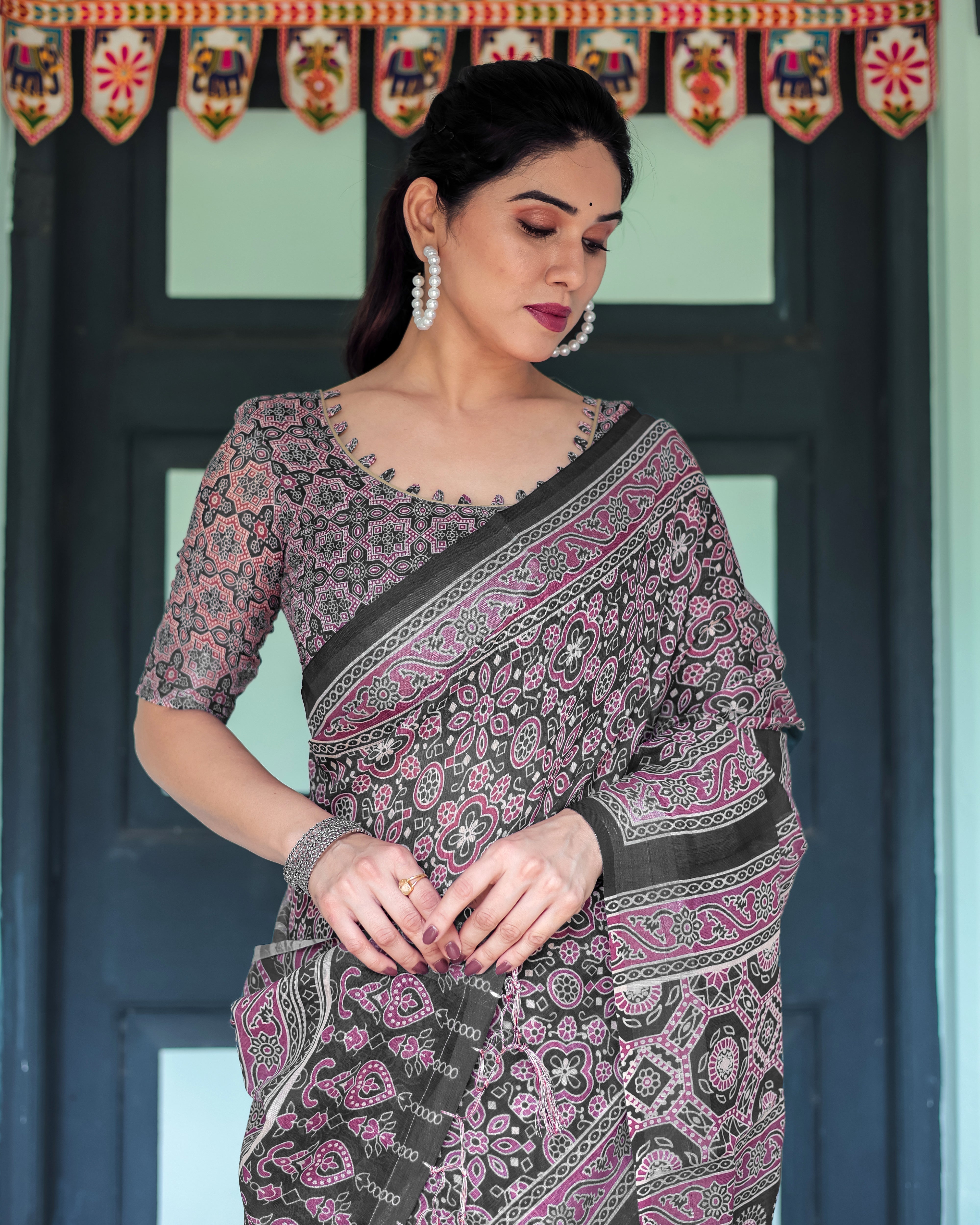 Black Pure Cotton Linen Saree with Pink Striped Pallu and Tassel Accents LINEN H 161170