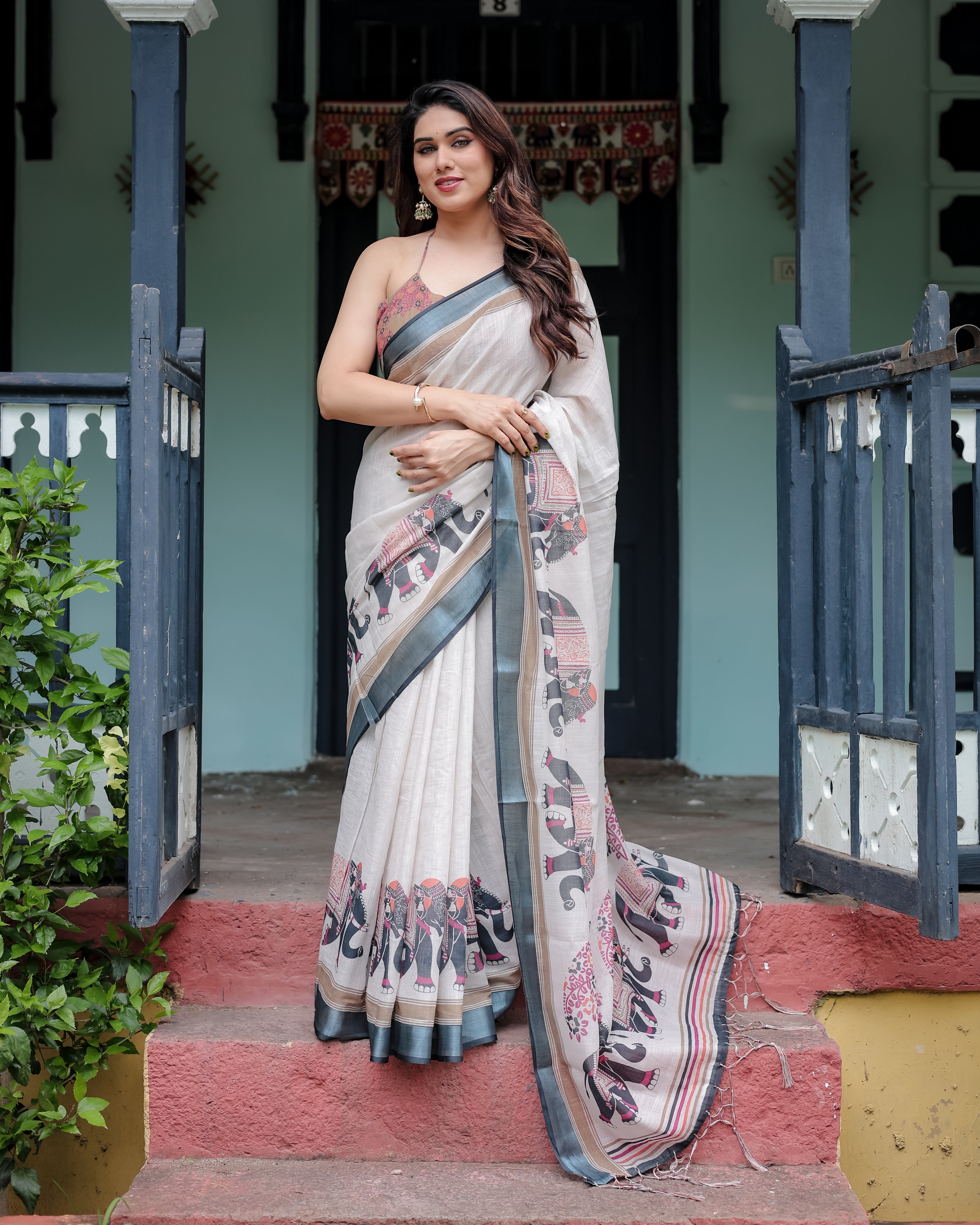 Ivory Pure Cotton Linen Saree with Elephant Motif and Tassel Detailing LINEN H 101110