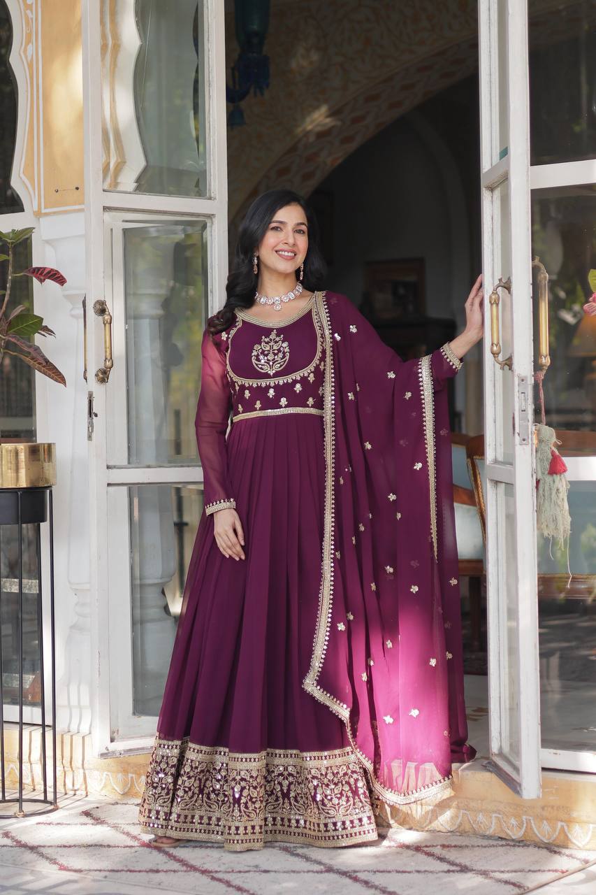 "Gracefully Embellished Kurta with Royal Threadwork Elegance"