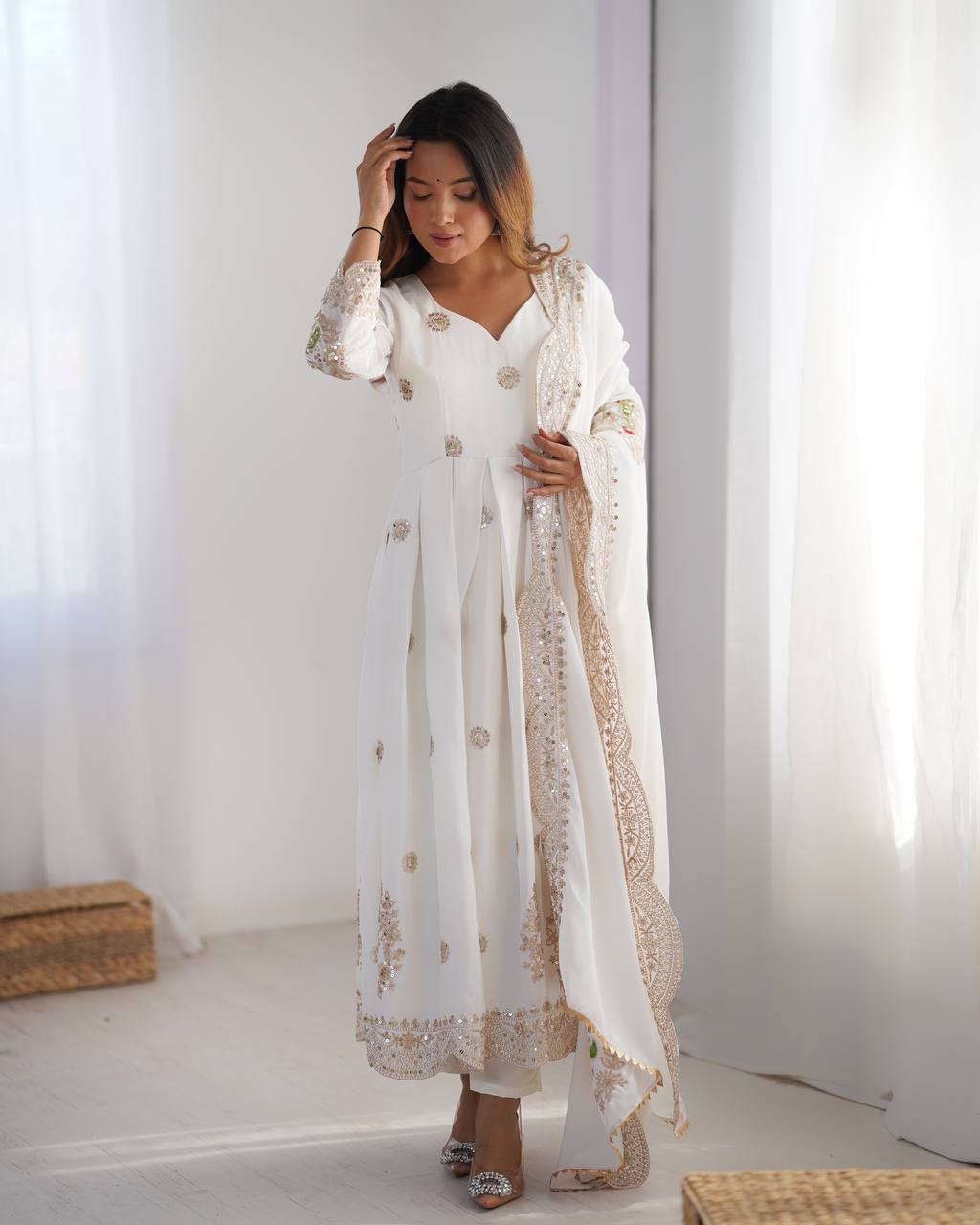 Royal Elegance: White Anarkali Suit with Traditional Touch