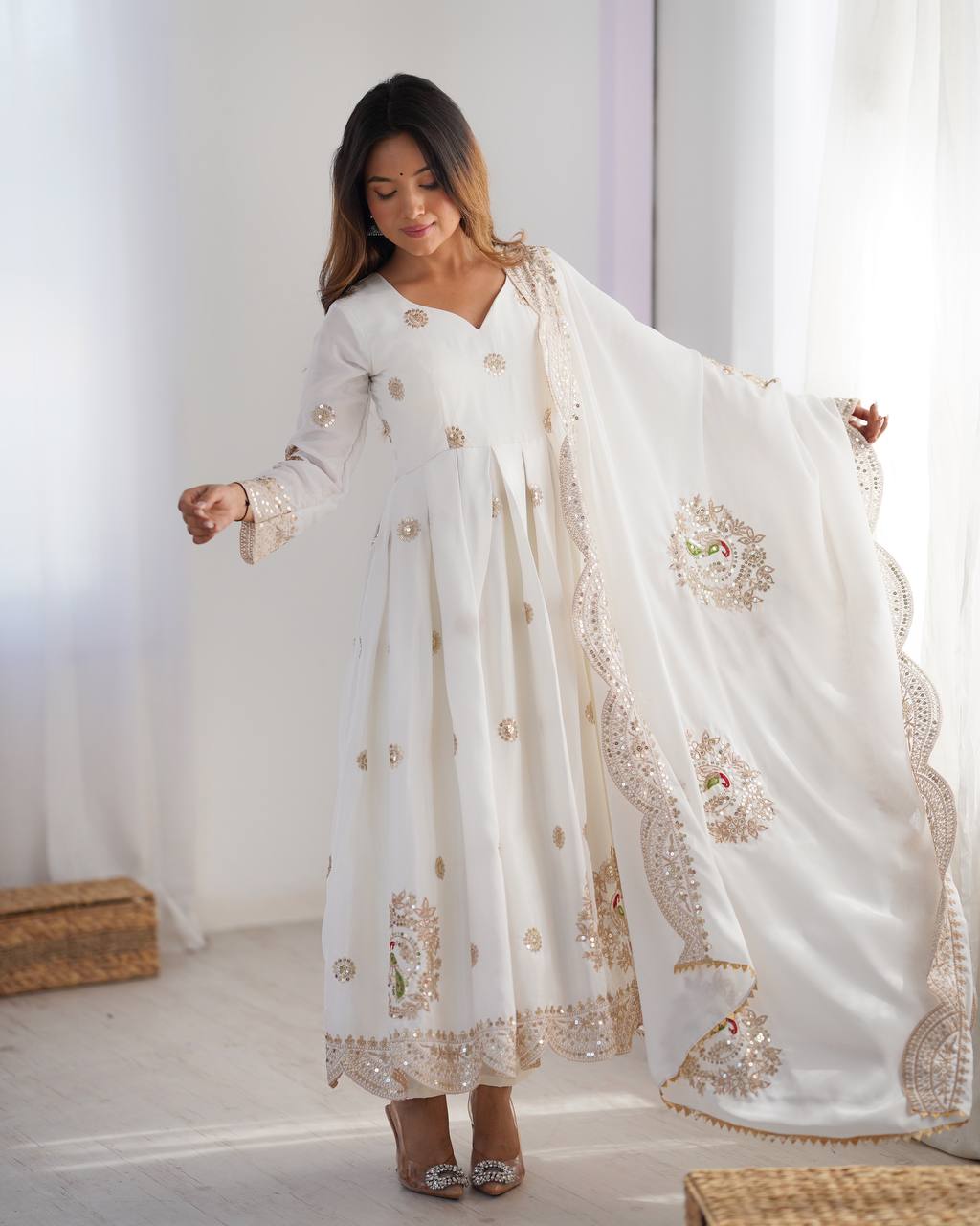 Royal Elegance: White Anarkali Suit with Traditional Touch