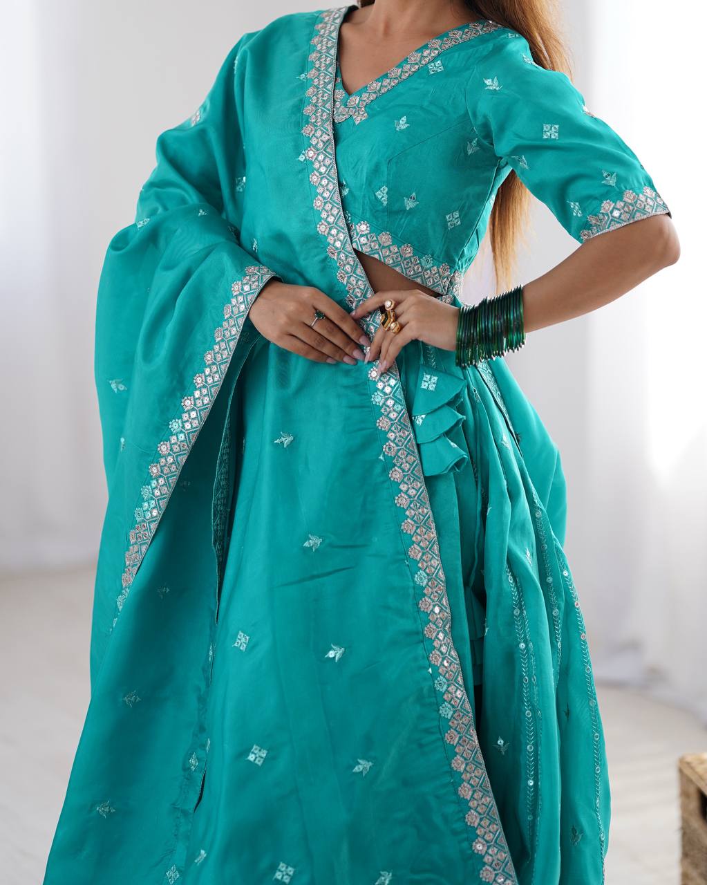 Teal Green Shimmer silk lehengha