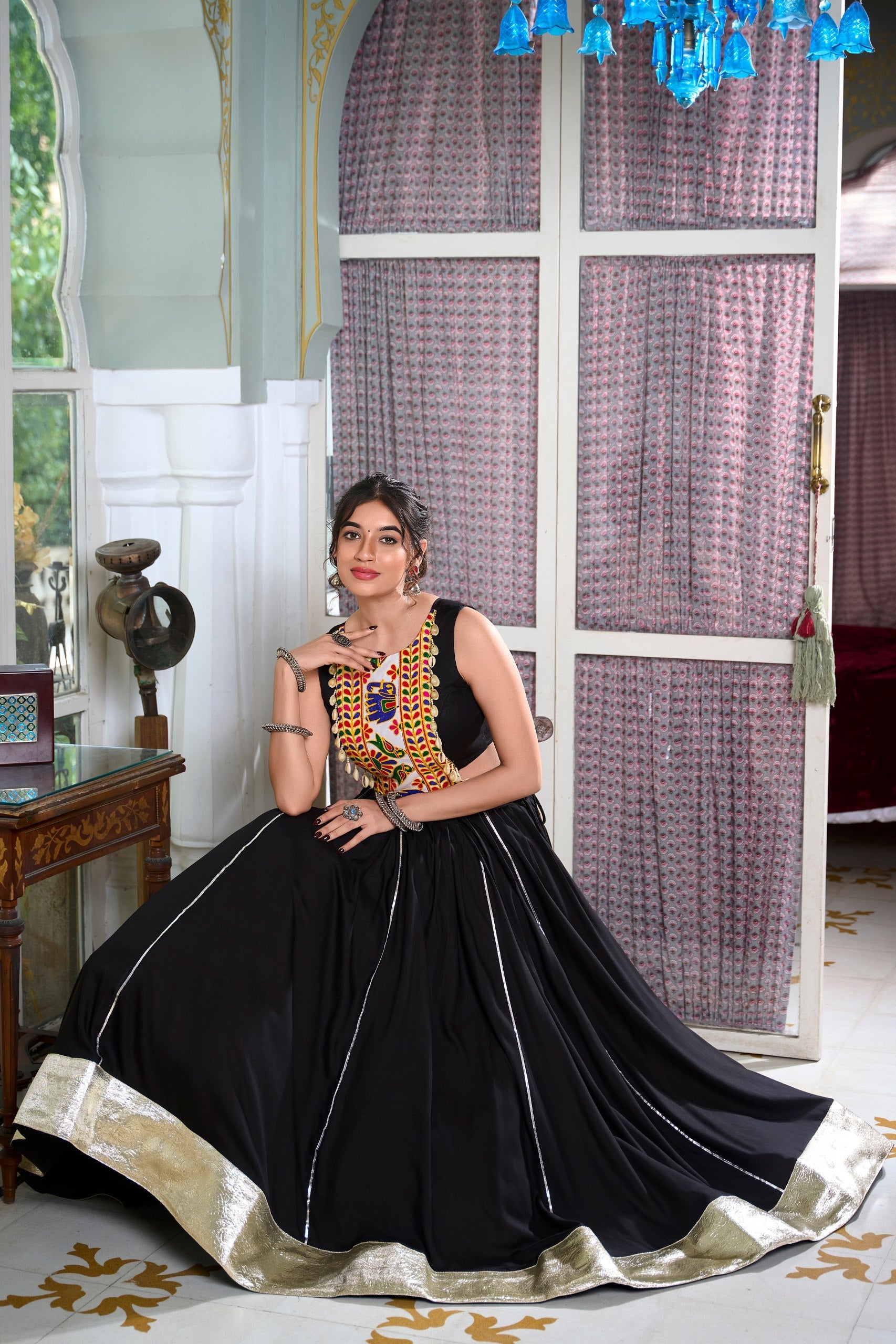 Traditional Mirror Work Sleeveless Blouse with Ghera Lehenga